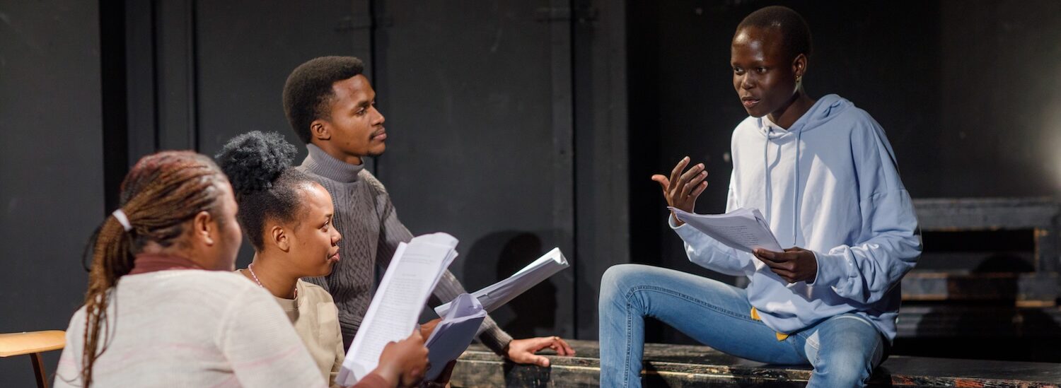 Actors on Stage aspect ratio 1512 554