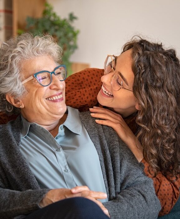 Older Lady and Younger Lady Laughing aspect ratio 303 367 2