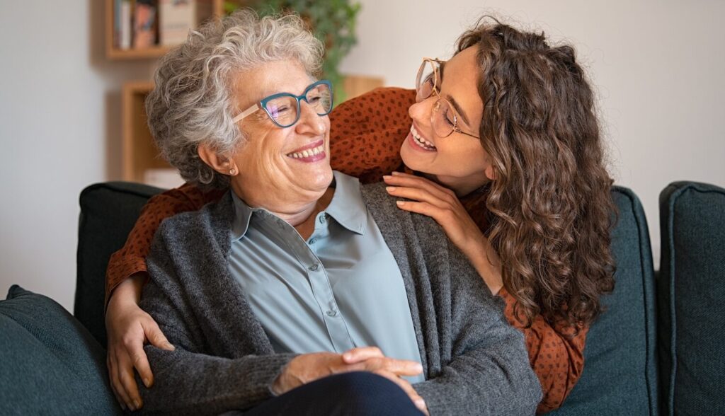 Older Lady and Younger Lady Laughing aspect ratio 564 324