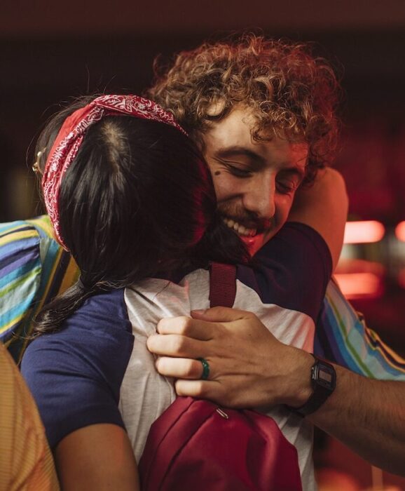Two actors hugging aspect ratio 303 367 2