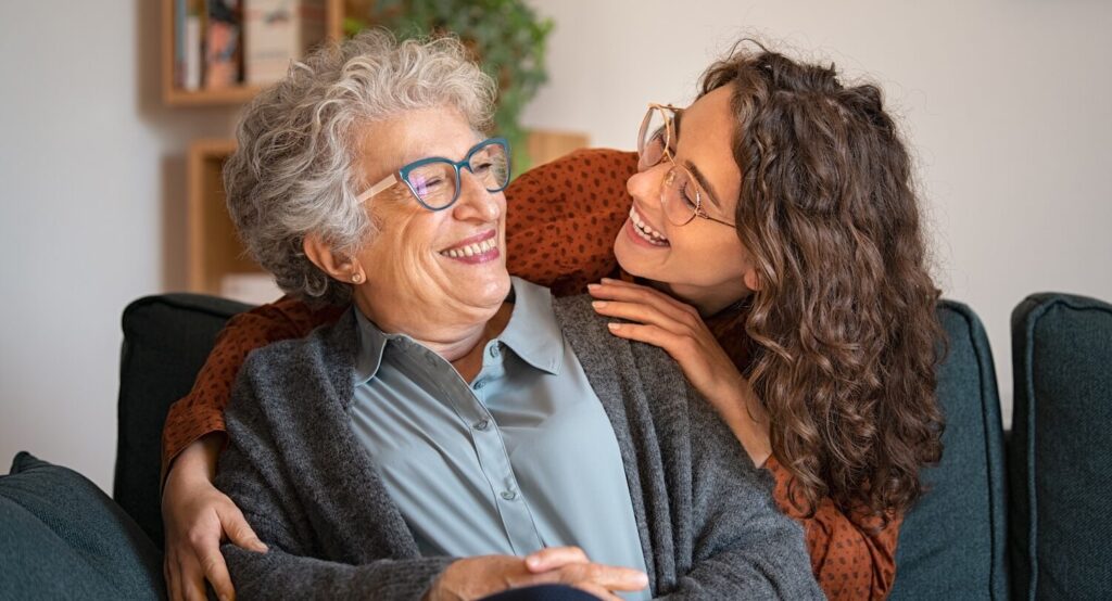 Older-Lady-and-Younger-Lady-Laughing-aspect-ratio-850-460